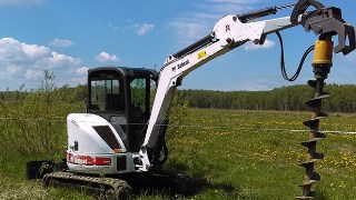 Аренда экскаватора погрузчика с ямобуром в Боровичи цена от 1557 руб